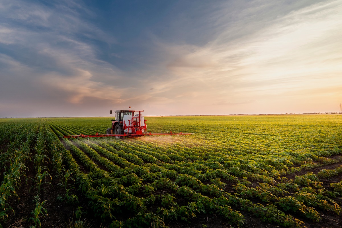 Tractor,Spraying,Pesticides,On,Soy,Field,With,Sprayer,At,Spring